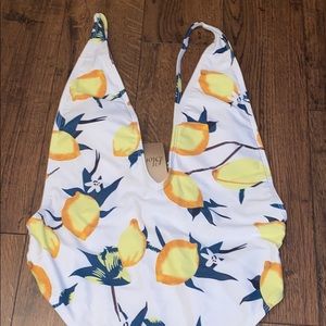 Cute one piece swimwear. Lemon and white